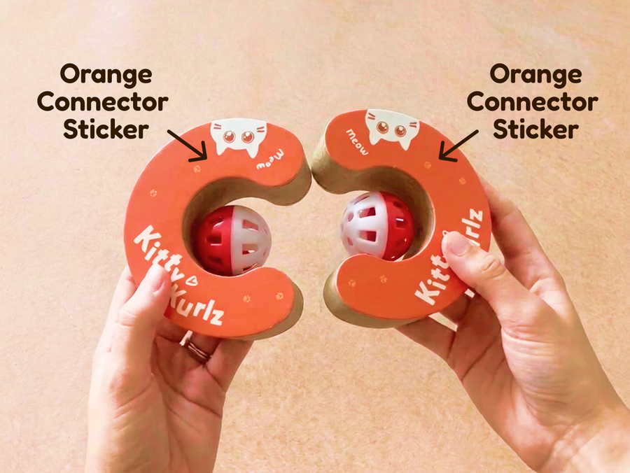 Both Kitty Kurlz with orange connector stickers